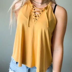 Forever 21 women’s yellow tank top in size small
